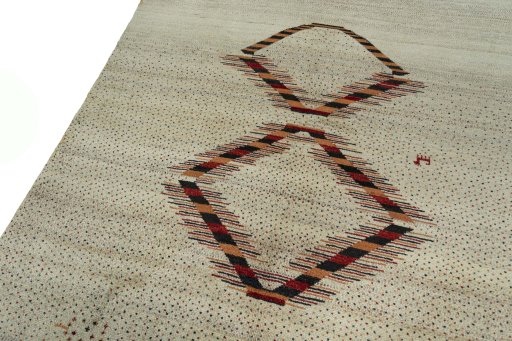Backside of handmade New Persian Gabbeh rug showing knot structure and weave density