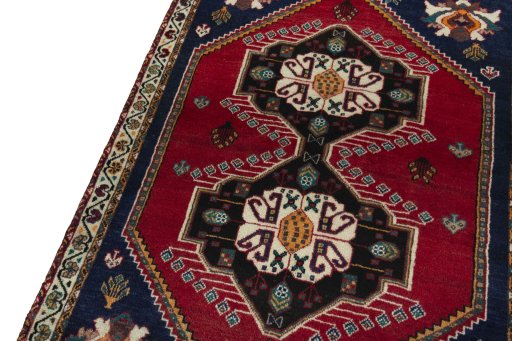 Backside of handmade 2000s Persian Gabbeh rug showing knot structure and weave density