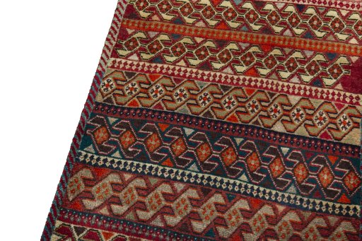 Backside of handmade 2000s Persian Gabbeh rug showing knot structure and weave density