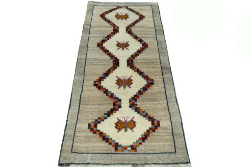 Surface texture of 2000s Persian Gabbeh rug with natural Wool and intricate pattern
