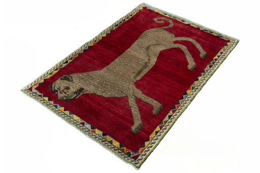 Corner detail of 2000s Persian Gabbeh rug showing border pattern and Wool pile