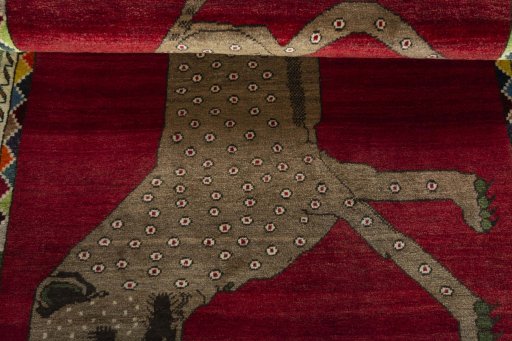 Full view of 2000s Persian Gabbeh rug from Iran / Persia, 162 × 109 cm in Red tones