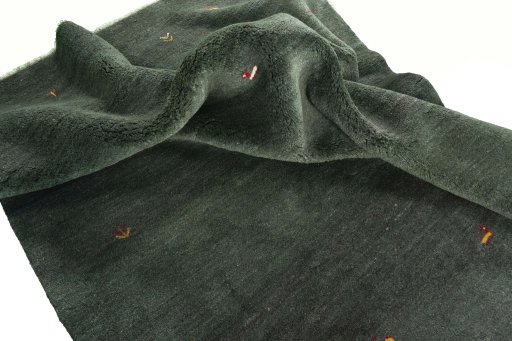 Corner detail of New Persian Gabbeh rug showing border pattern and Wool pile