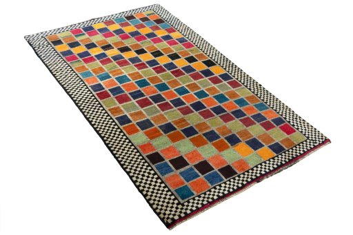 Close-up detail of 2000s Persian Gabbeh rug from Iran / Persia showing Wool weave