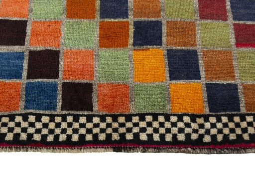 Central medallion detail of 2000s Persian Gabbeh rug from Iran / Persia