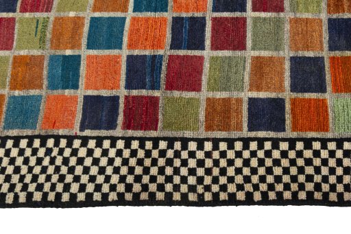 Close-up detail of 2000s Persian Gabbeh rug from Iran / Persia showing Wool weave