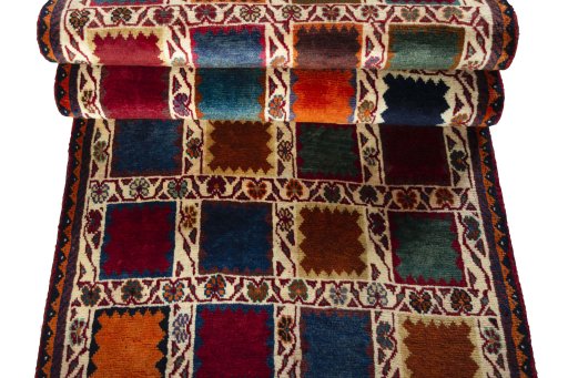 Full view of 2000s Persian Gabbeh rug from Iran / Persia, 243 × 81 cm in Multi Color tones