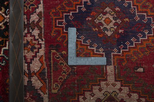Surface texture of 2000s Persian Gabbeh rug with natural Wool and intricate pattern
