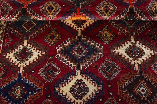 Full view of 2000s Persian Gabbeh rug from Iran / Persia, 197 × 130 cm in Red tones