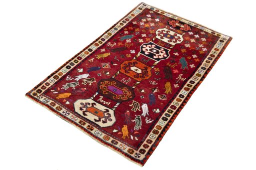 Corner detail of 2000s Persian Gabbeh rug showing border pattern and Wool pile