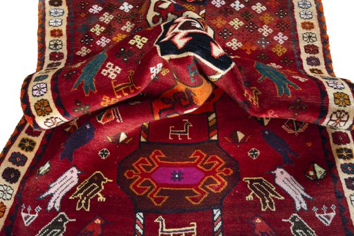 Full view of 2000s Persian Gabbeh rug from Iran / Persia, 163 × 105 cm in Red tones