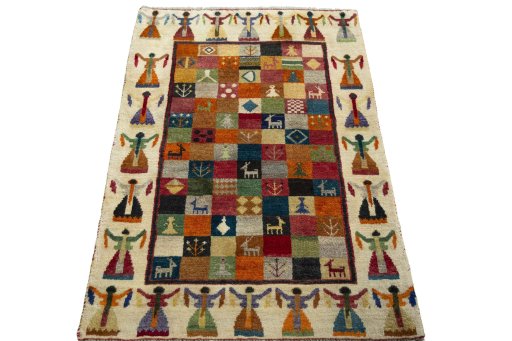 Surface texture of 2000s Persian Gabbeh rug with natural Wool and intricate pattern