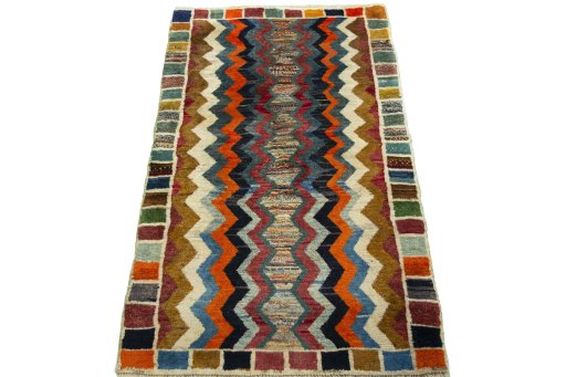 Surface texture of 2000s Persian Gabbeh rug with natural Wool and intricate pattern