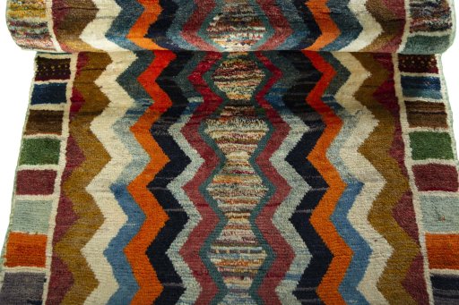 Full view of 2000s Persian Gabbeh rug from Iran / Persia, 137 × 77 cm in Multi Color tones