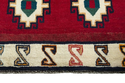 Central medallion detail of 2000s Persian Gabbeh rug from Iran / Persia