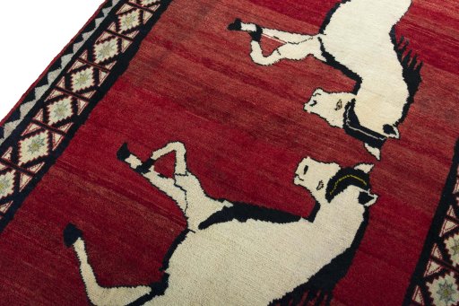 Backside of handmade 2000s Persian Gabbeh rug showing knot structure and weave density
