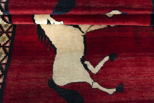 Full view of 2000s Persian Gabbeh rug from Iran / Persia, 241 × 148 cm in Red tones