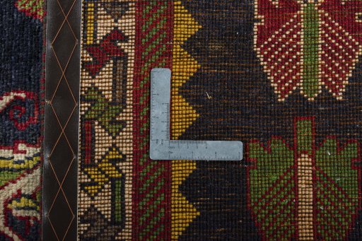 Close-up detail of 2000s Persian Gabbeh rug from Iran / Persia showing Wool weave
