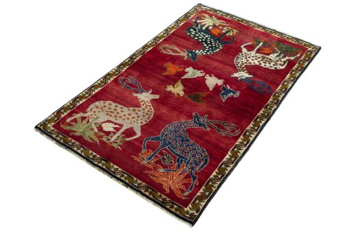 Corner detail of 2000s Persian Gabbeh rug showing border pattern and Wool pile