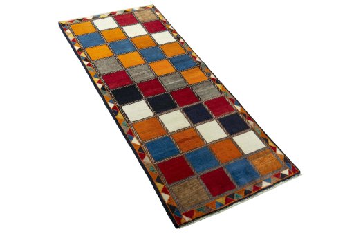 Close-up detail of 2000s Persian Gabbeh rug from Iran / Persia showing Wool weave
