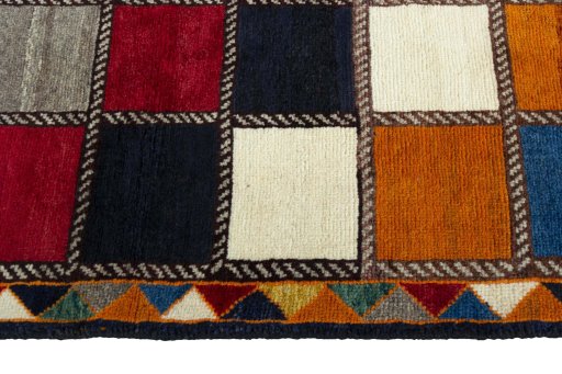 Close-up detail of 2000s Persian Gabbeh rug from Iran / Persia showing Wool weave