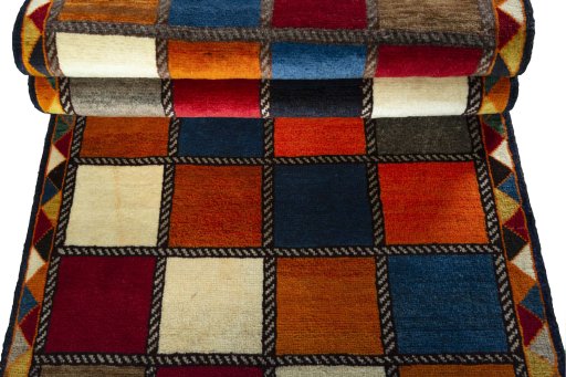 Full view of 2000s Persian Gabbeh rug from Iran / Persia, 193 × 81 cm in Multi Color tones