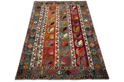Surface texture of 2000s Persian Gabbeh rug with natural Wool and intricate pattern