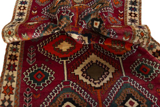 Corner detail of 2000s Persian Gabbeh rug showing border pattern and Wool pile
