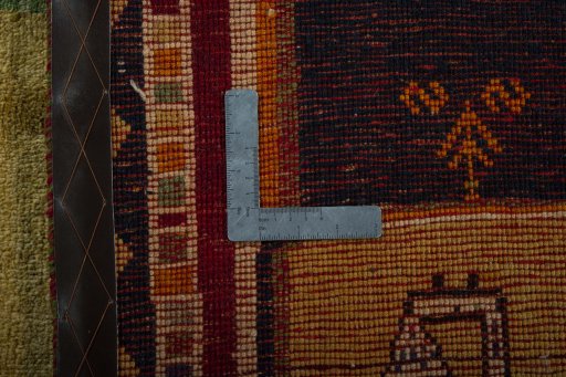 Close-up detail of 2000s Persian Gabbeh rug from Iran / Persia showing Wool weave