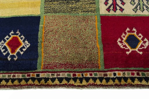 Central medallion detail of 2000s Persian Gabbeh rug from Iran / Persia