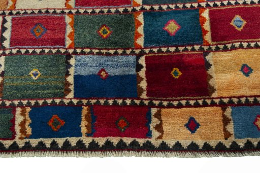 Central medallion detail of 2000s Persian Gabbeh rug from Iran / Persia