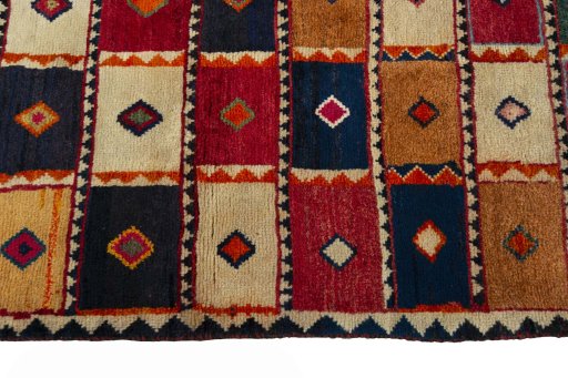 Close-up detail of 2000s Persian Gabbeh rug from Iran / Persia showing Wool weave