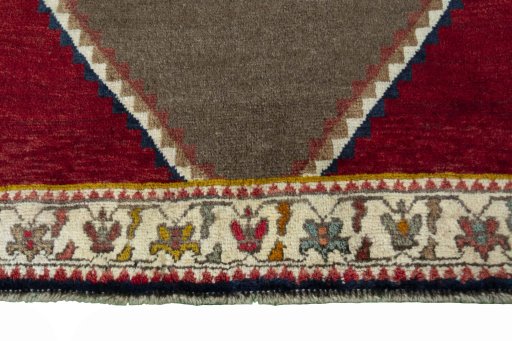 Central medallion detail of 2000s Persian Gabbeh rug from Iran / Persia