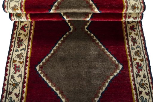 Full view of 2000s Persian Gabbeh rug from Iran / Persia, 183 × 95 cm in Red tones