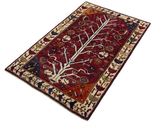 Corner detail of 2000s Persian Gabbeh rug showing border pattern and Wool pile