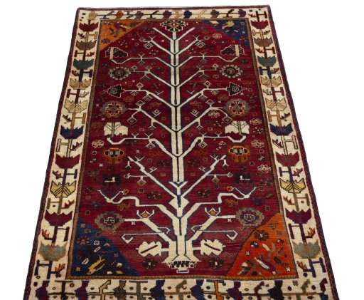 Surface texture of 2000s Persian Gabbeh rug with natural Wool and intricate pattern