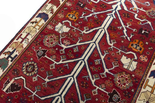 Backside of handmade 2000s Persian Gabbeh rug showing knot structure and weave density