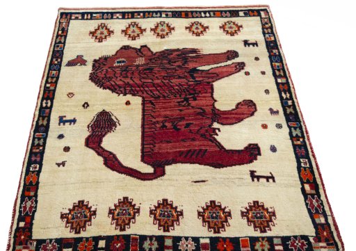 Surface texture of 2000s Persian Gabbeh rug with natural Wool and intricate pattern