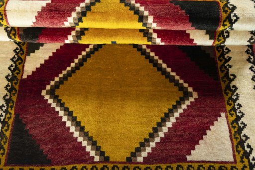 Full view of 2000s Persian Gabbeh rug from Iran / Persia, 195 × 127 cm in Red tones