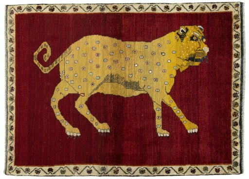 Full view of 2000s Persian Gabbeh rug from Iran / Persia, 172 × 127 cm in Red tones