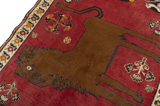Backside of handmade 2000s Persian Gabbeh rug showing knot structure and weave density