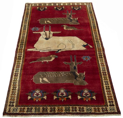 Surface texture of 2000s Persian Gabbeh rug with natural Wool and intricate pattern
