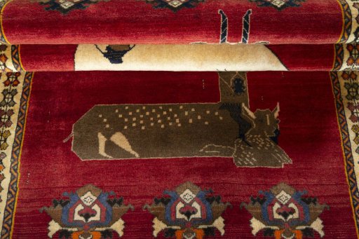 Full view of 2000s Persian Gabbeh rug from Iran / Persia, 215 × 120 cm in Red tones