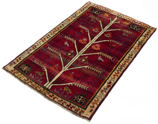 Corner detail of 2000s Persian Gabbeh rug showing border pattern and Wool pile