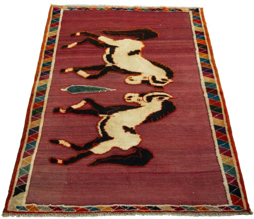 Surface texture of 2000s Persian Gabbeh rug with natural Wool and intricate pattern