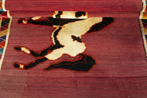 Full view of 2000s Persian Gabbeh rug from Iran / Persia, 151 × 108 cm in Red tones
