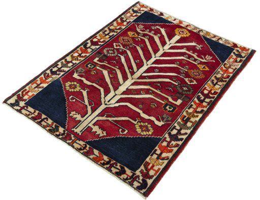 Corner detail of 2000s Persian Gabbeh rug showing border pattern and Wool pile