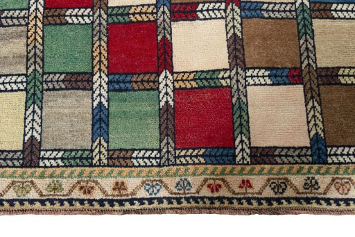 Central medallion detail of 2000s Persian Gabbeh rug from Iran / Persia