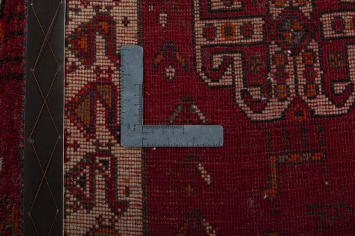Surface texture of 2000s Persian Gabbeh rug with natural Wool and intricate pattern