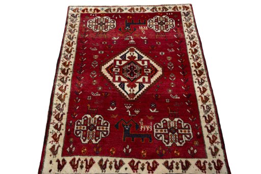 Surface texture of 2000s Persian Gabbeh rug with natural Wool and intricate pattern